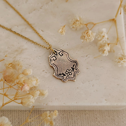 Collana Sabrina in ottone con motivi floreali