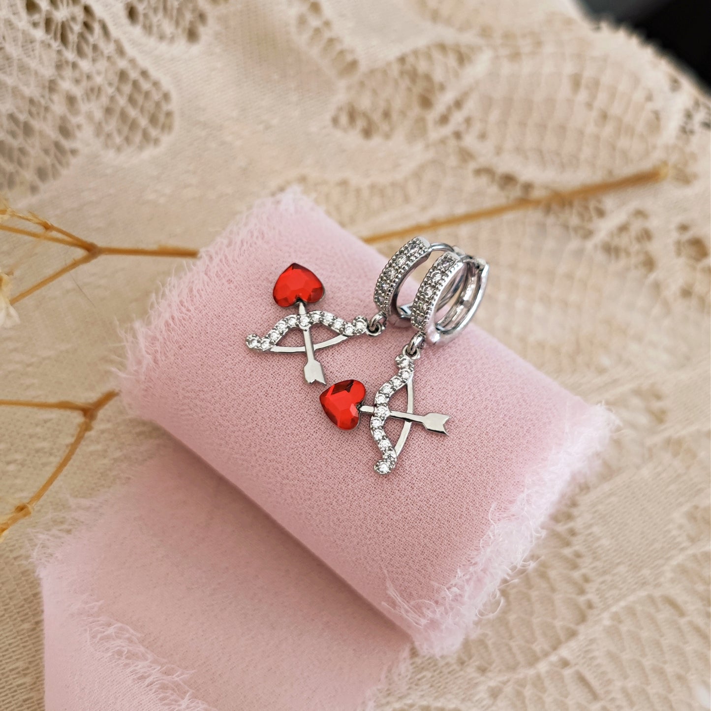 "Tenderly" micro hoop earrings with heart bow and arrow, silver