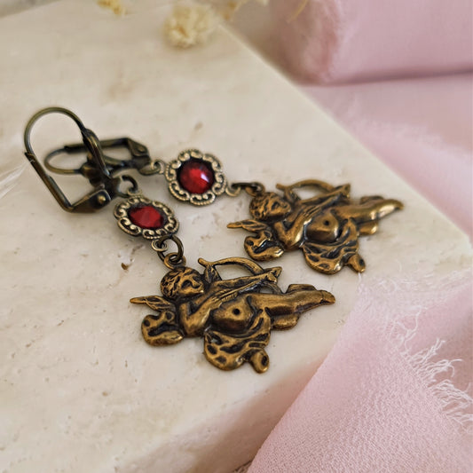 Bronzed earrings "Love is in the air" with cupid and red crystals
