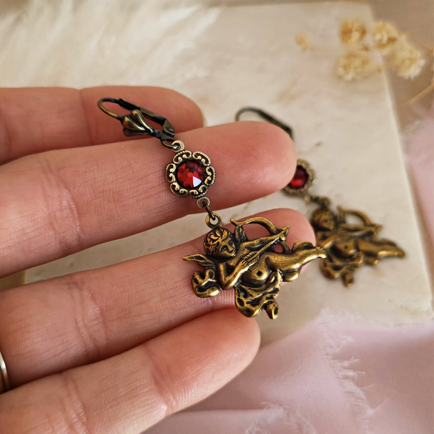 Bronzed earrings "Love is in the air" with cupid and red crystals
