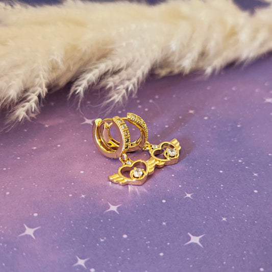 Orecchini micro-hoops "Winged Heart" con cristalli