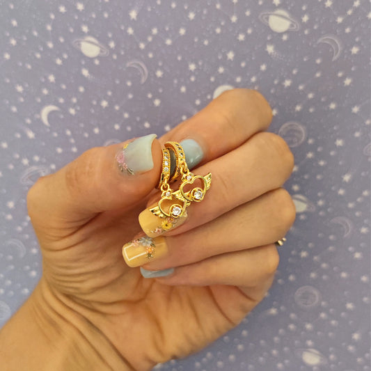Orecchini micro-hoops "Winged Heart" con cristalli