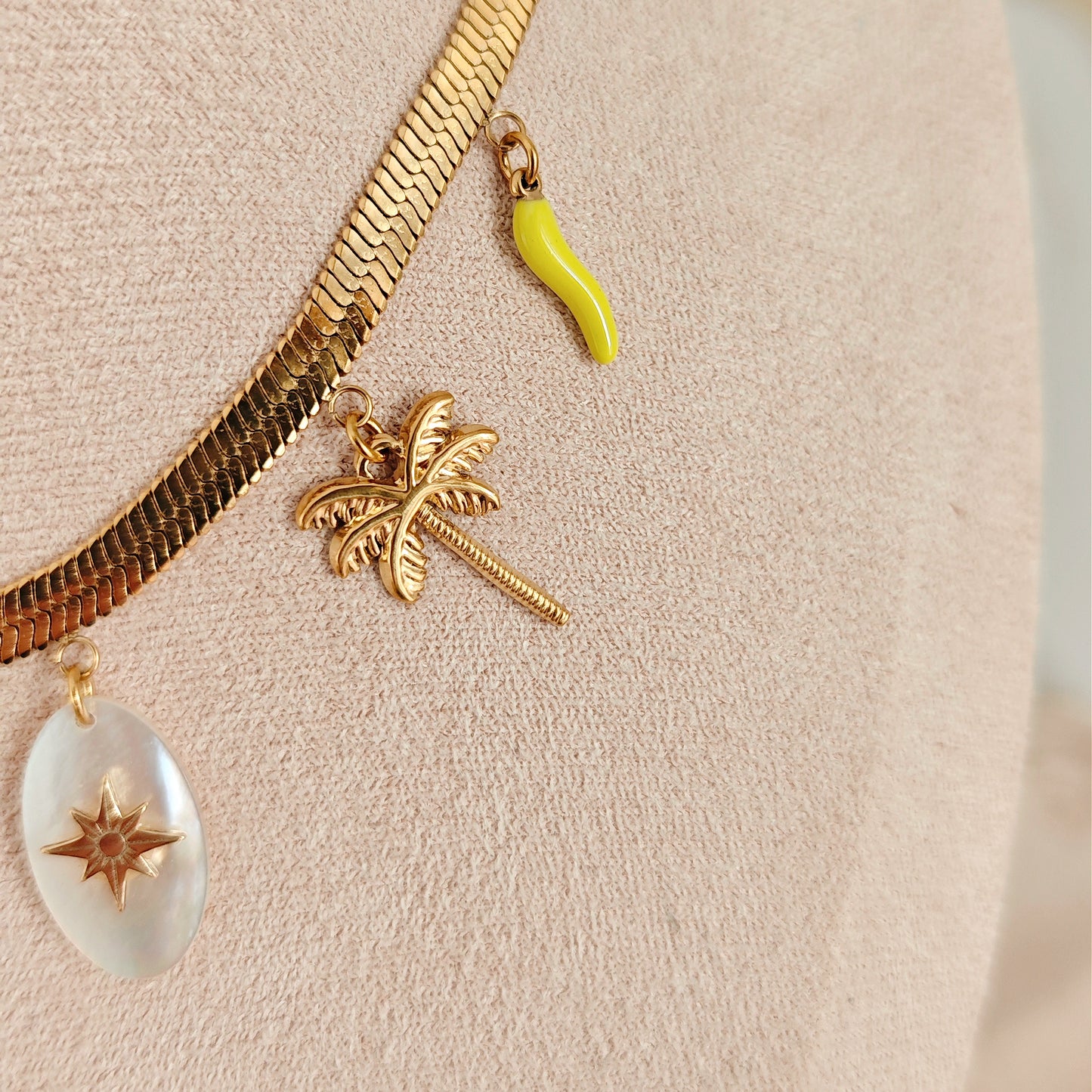 "Golden Wave" necklace with mother-of-pearl and enamel charms