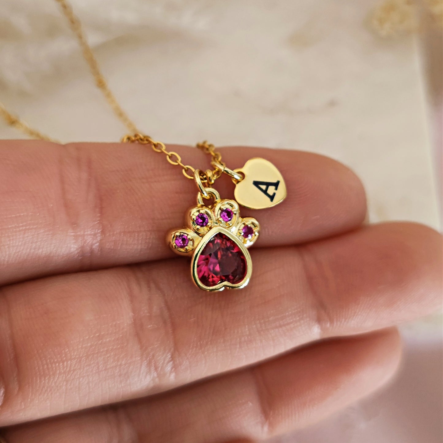 "Paw-lentine" necklace with heart-shaped paw and initial