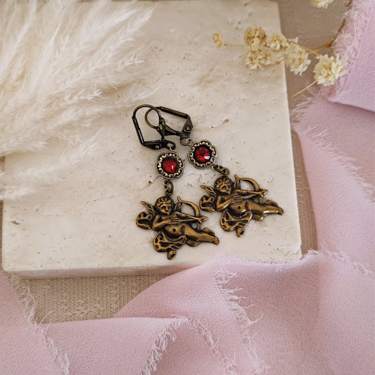 Bronzed earrings "Love is in the air" with cupid and red crystals