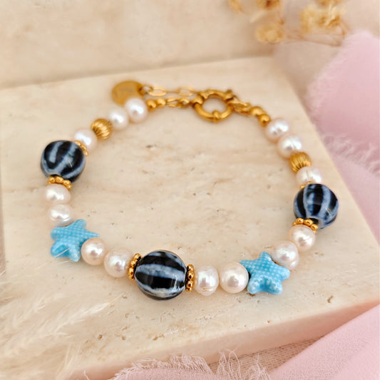 "Blue Lagoon" bracelet with freshwater pearls and blue ceramic beads