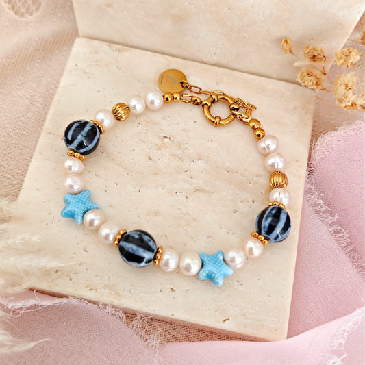 "Blue Lagoon" bracelet with freshwater pearls and blue ceramic beads
