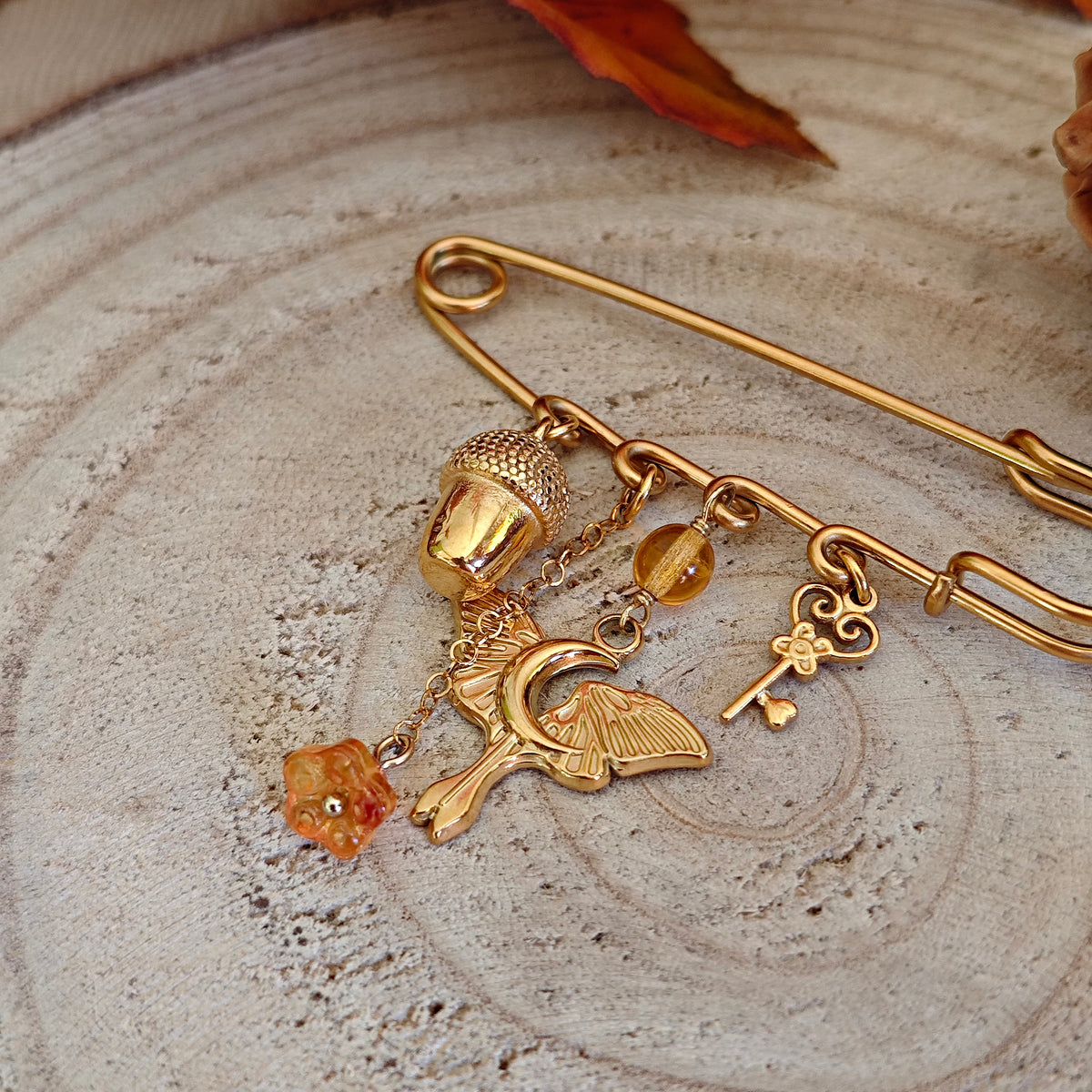 Spilla dorata "A Key to Otherwood"